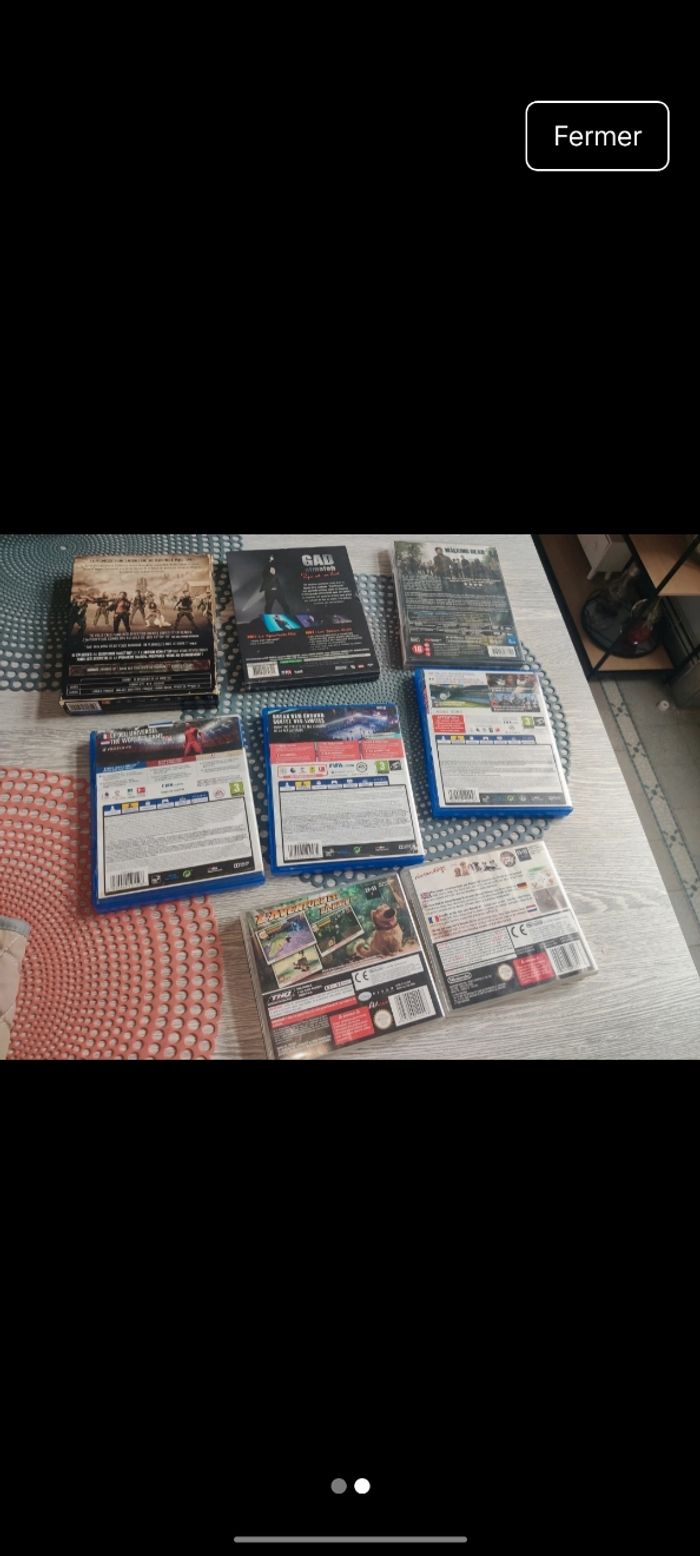 Lot de DVD et jeux - photo numéro 2