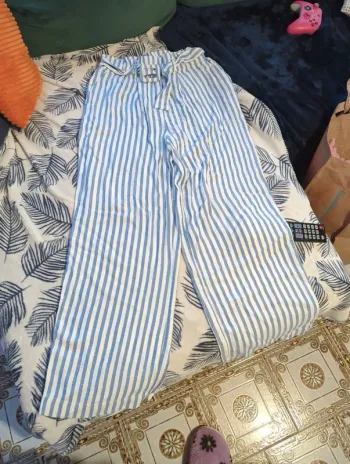 Pantalon rayé jambes évasées