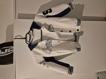 Veste Bleu et blanche 4 ans 5.00€