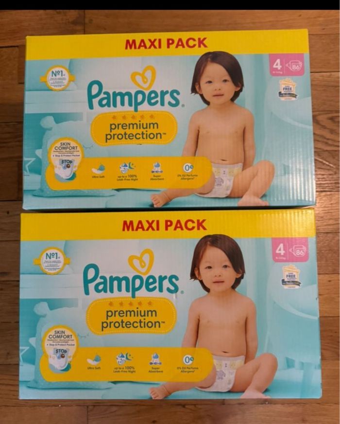 2 cartons de couches Pampers taille 4