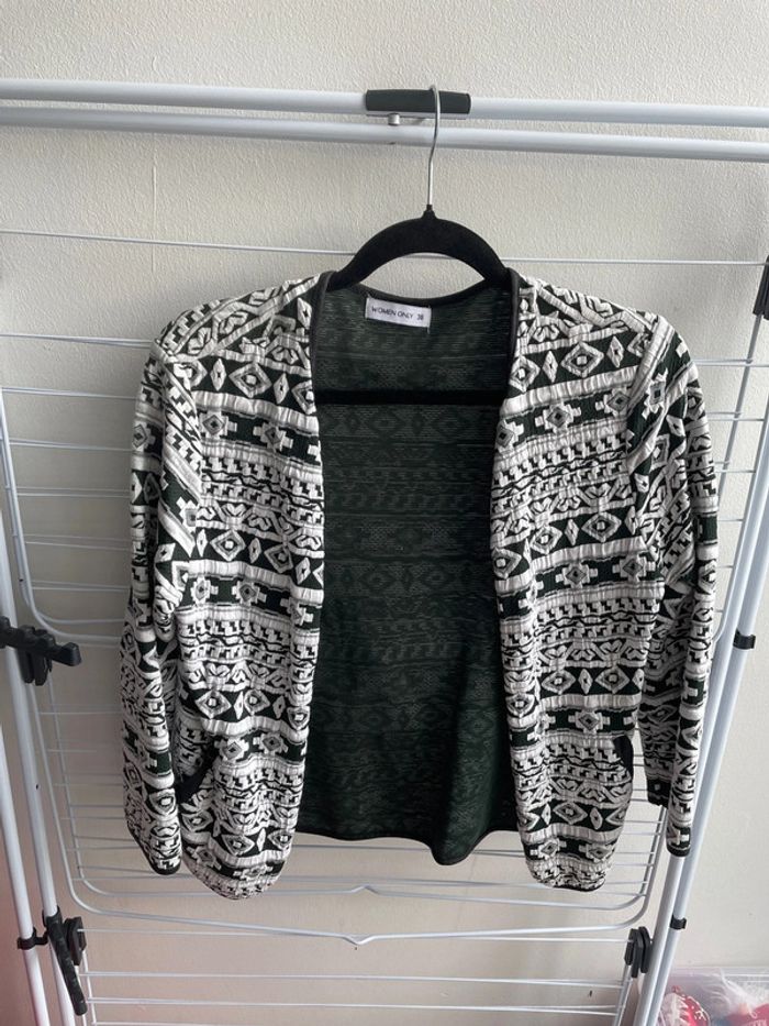 Veste verte et blanche