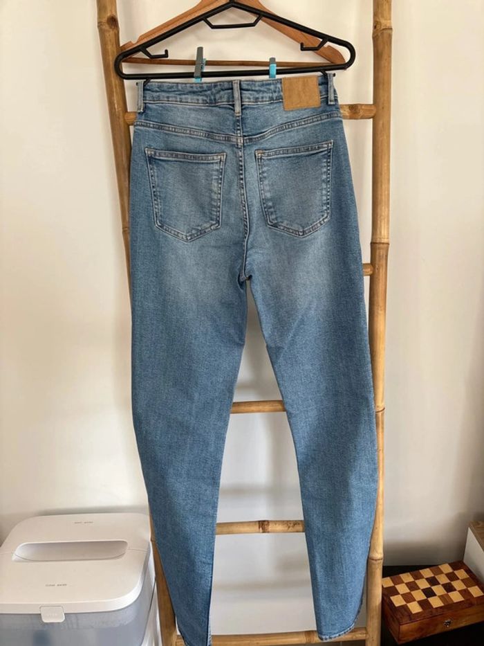 Jean bleu zara taille 38 fentes en bas des jambes - photo numéro 10