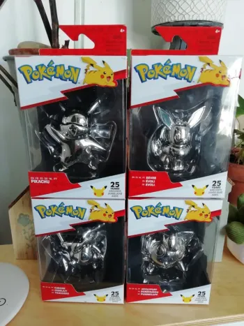 Lot figurines Pokémon pokemon anniversaire 25th argent Pikachu Evoli Osselait Rondoudou