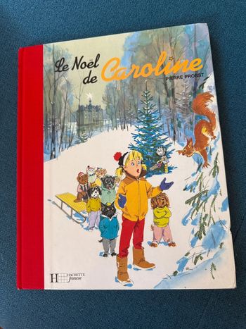 Reliure rouge édition limitée de collection livre bd Le Noël de Caroline bon état