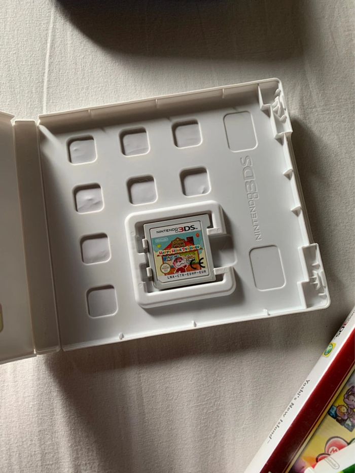 Lot de 3 jeux nintendo 3DS avec pochette de DS - photo numéro 4