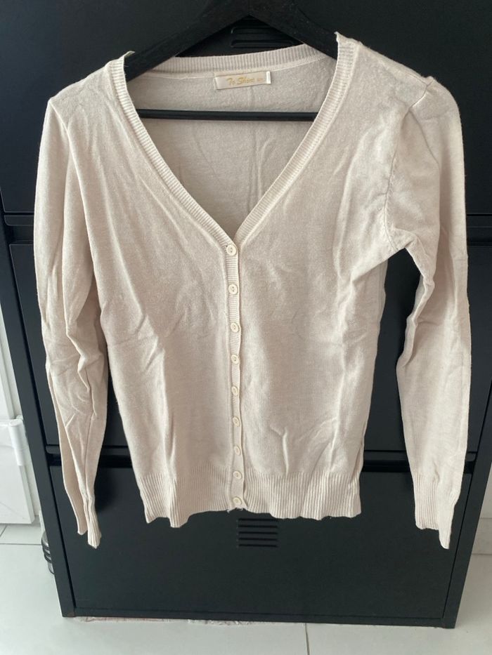 Gilet beige avec bouton
