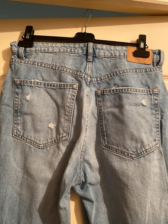 Jeans troué - photo numéro 8