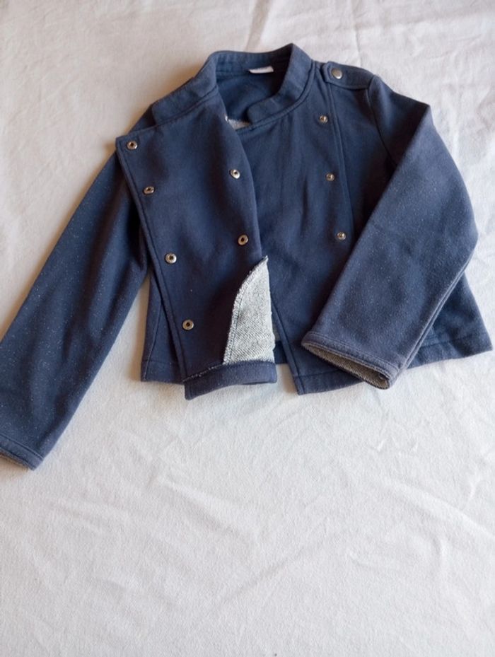 Veste à pression de taille 8ans et de marque tape a l'œil