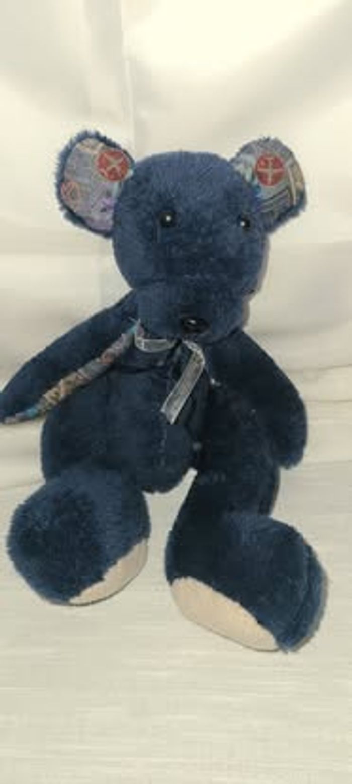 doudou ours bleu imprimé oreilles