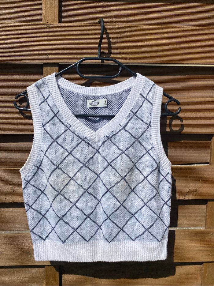 Pull sans manche à carreaux
