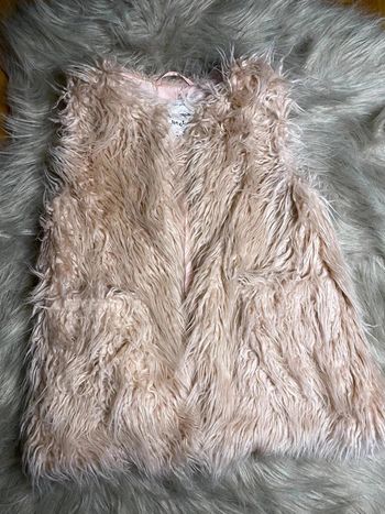 Gilet sans manche à poil rose
