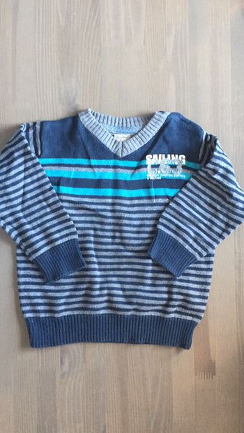 Pull encolure à bouton