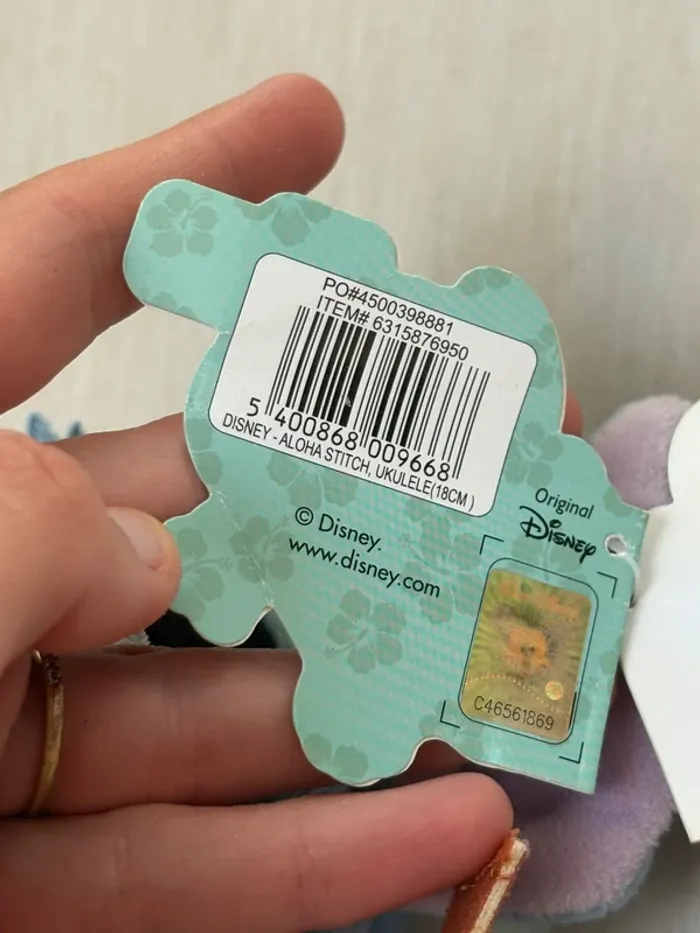 Peluche Stitch avec guitare banjo yukelele et collier hawaïen Lilo et Stitch Disney - photo numéro 6