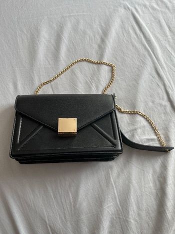 Sacoche noire avec chaîne doré