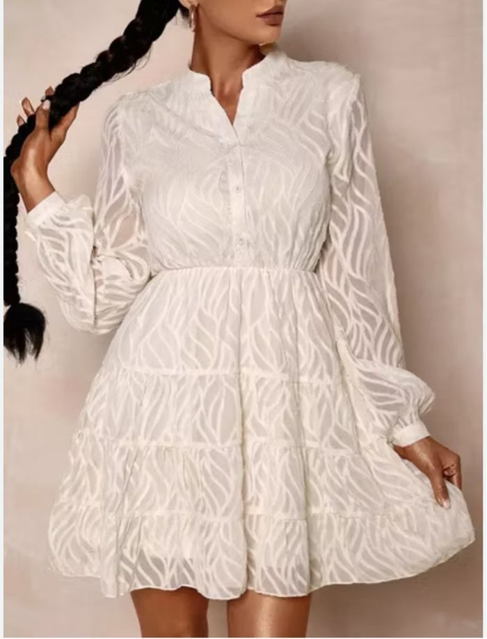 Robe élégante blanc cassé