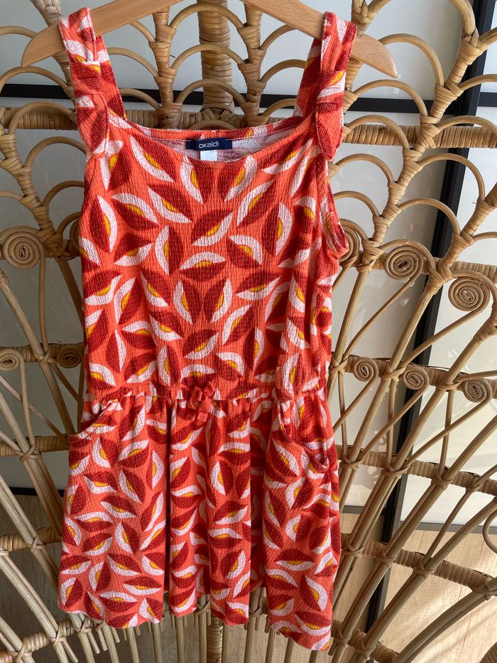 Robe Okaidi tons oranges 8 ans. Bretelles, poches
