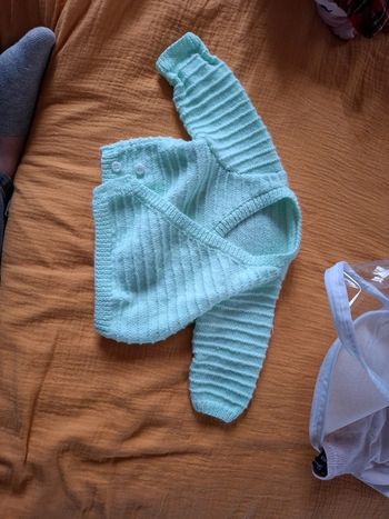 Gilet chaud avec bonnet assorti
