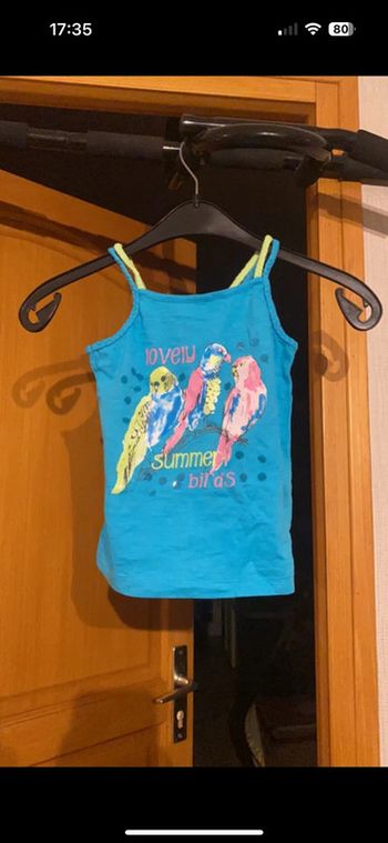 Débardeur perroquet bleu turquoise 6 ans