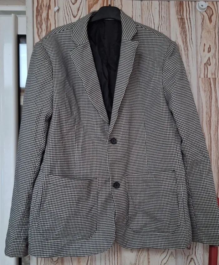 Veste avec poches intérieures taille 50 en très bon état "esprit"