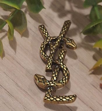 Broche femme YSL