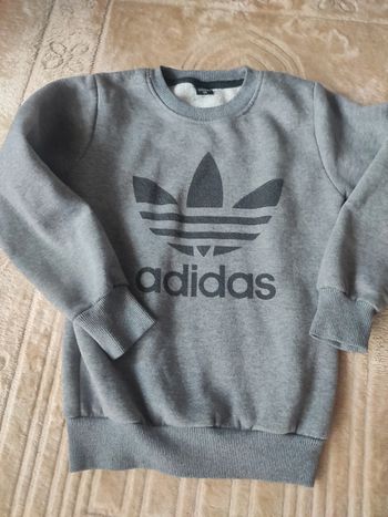 Pull gris chaud taille 134