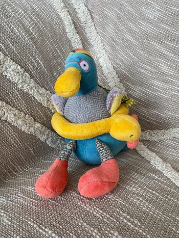 Peluche doudou musical 24cm moulin roty les cousins canard bleu et jaune rose très bon état