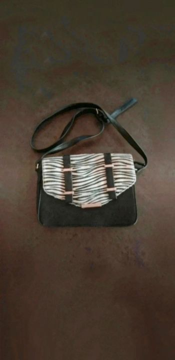 Pochette simili cuir et imprimé zèbre Texto