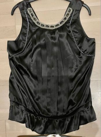 Blouse satinée idéale à porter pour les fêtes et occasions à venir