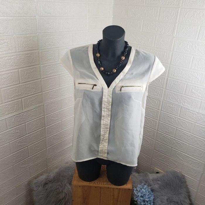 Blouse sans manche taille 38