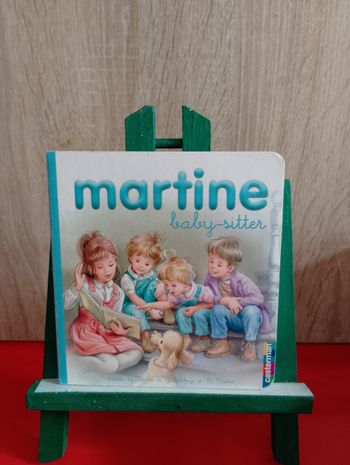Martine baby-sitter, cartonne