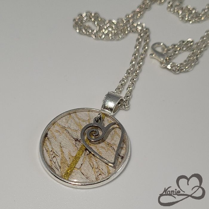 Sautoir argenté et doré avec un cœur - photo numéro 2