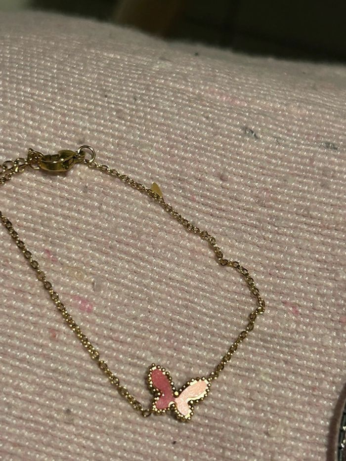 Bracelet acier doré papillon neuf