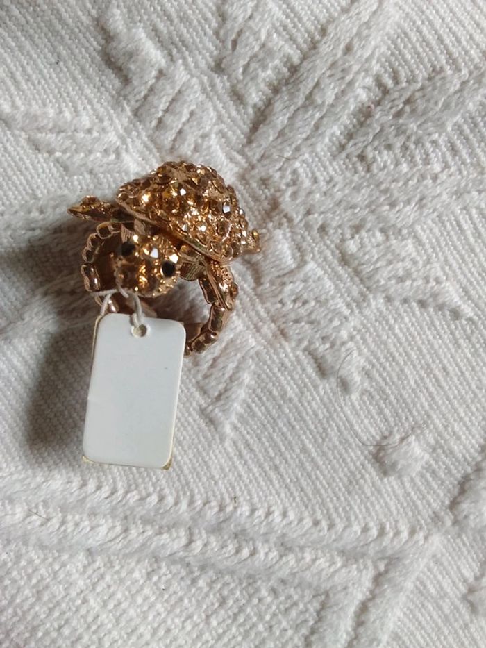Bague élastique tortue doré neuve avec étiquette