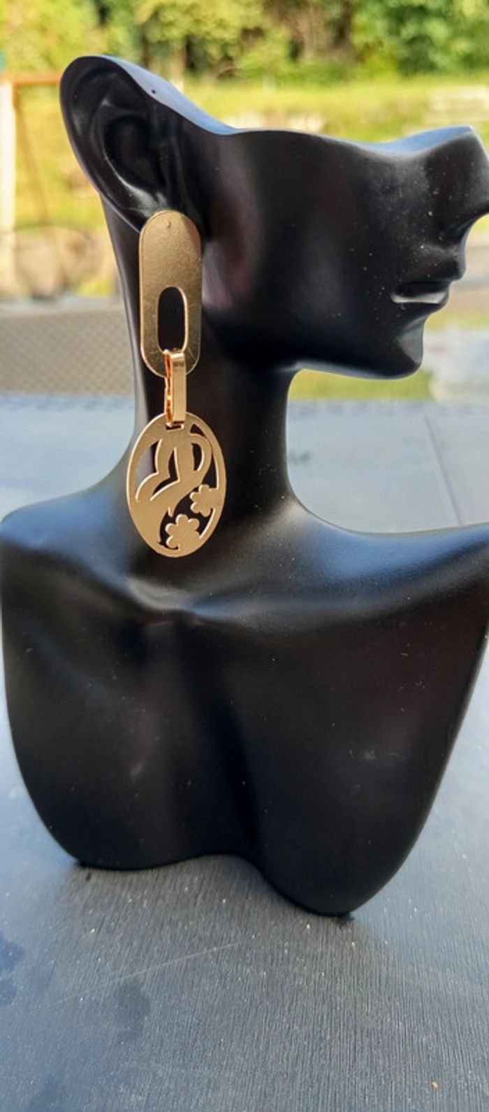 Boucles d'oreilles rondes a motifs femme