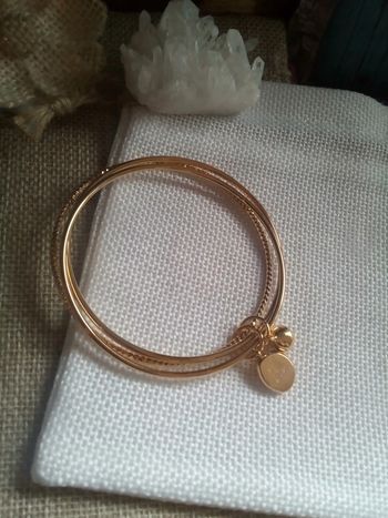 Bracelet triple et grelot