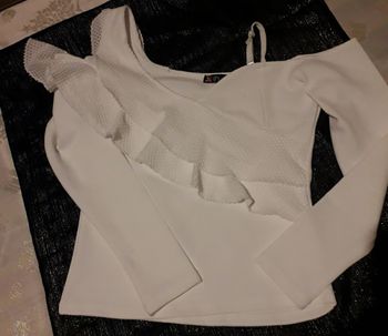 Tres beau pull blanc asymétrique taille L neuf