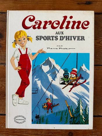 Très bon état - Grand livre ancien vintage Caroline aux sports d’hiver Pierre Probst blanc Hachette