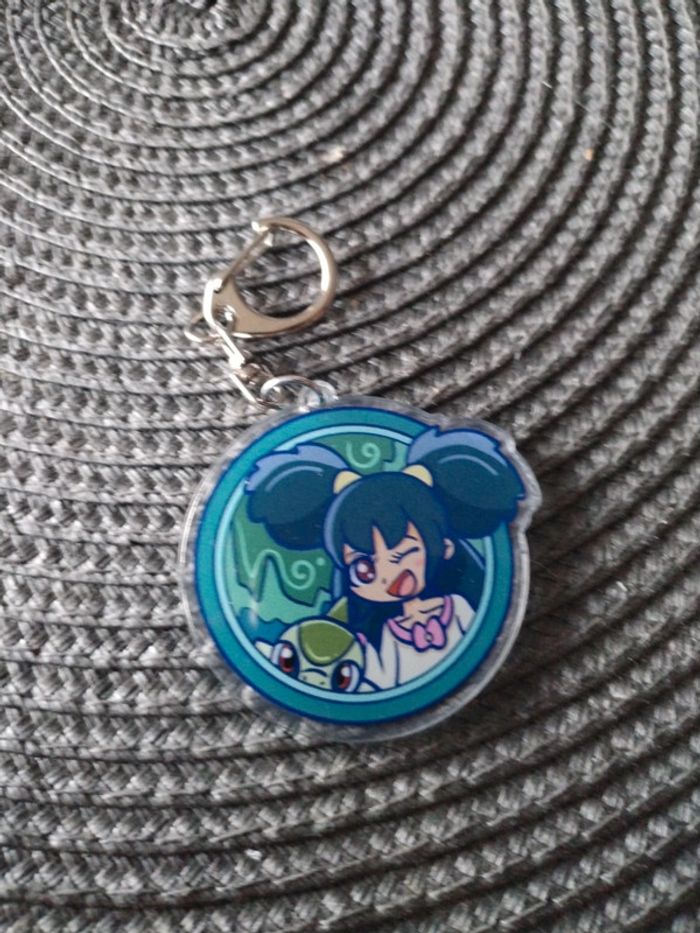 Porte clés pokémon acrylique dresseurs
