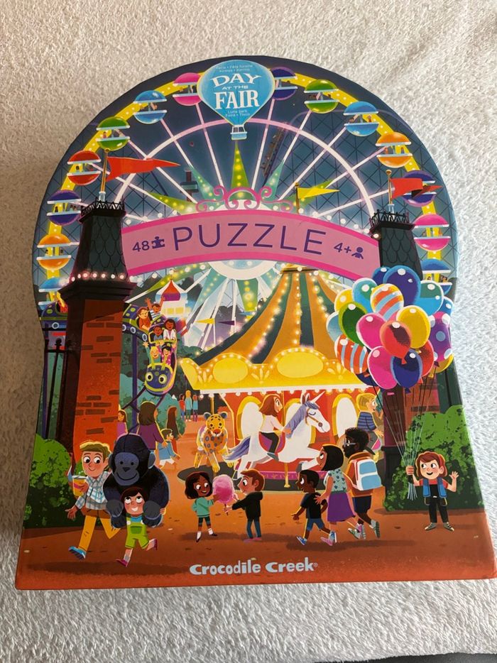Puzzle crocodile creek fête foraine Luna Park 48 pièces