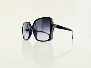 Lunette de soleil femme noire et argentée verres dégradés uvprotection catégorie 3