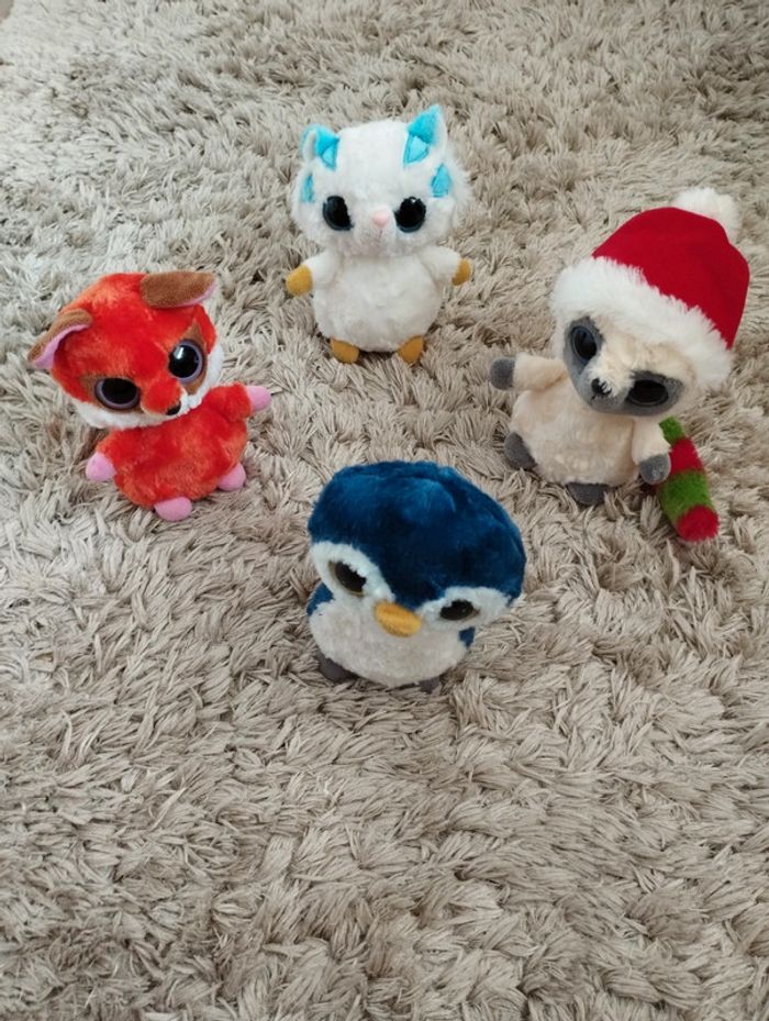 Lot peluches aux yeux brillants