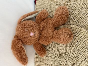 doudou lapin poche dos cooper