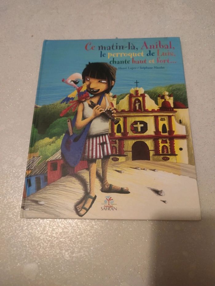 Album ce matin-là anibal le perroquet de Luis chante haut et fort