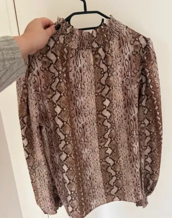 Blouse à motifs taille M neuve