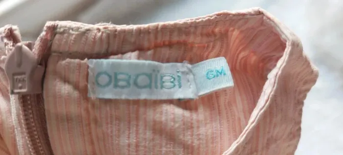 Robe Obaibi, rose et blanche, en très bon état, taille 6 mois - photo numéro 3
