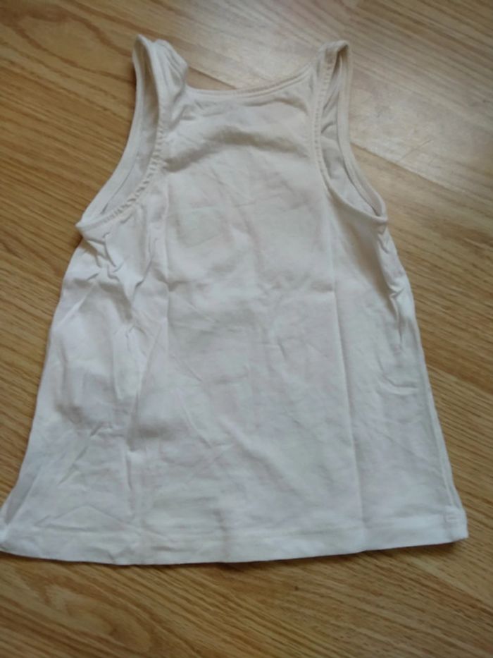 Débardeur blanc. Lunettes a paillettes. Filles. Kiabi
Taille 4 ans - photo numéro 5