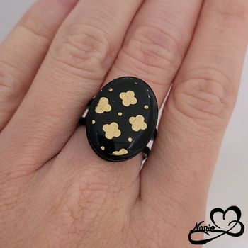 Bague ajustable ovale noire avec et dorée