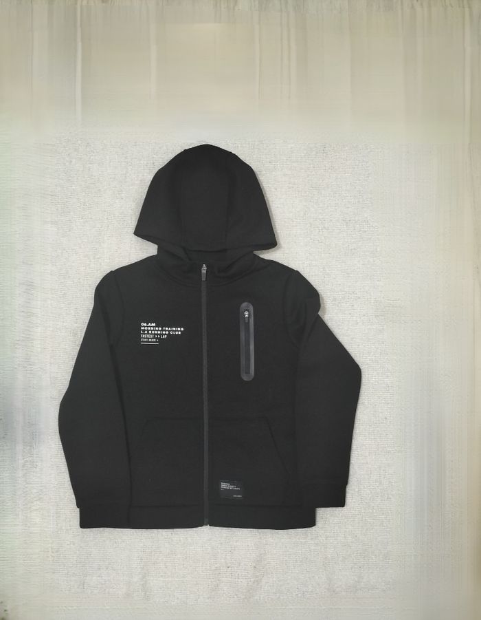 Sweat à capuche Kiabi taille 10 ans