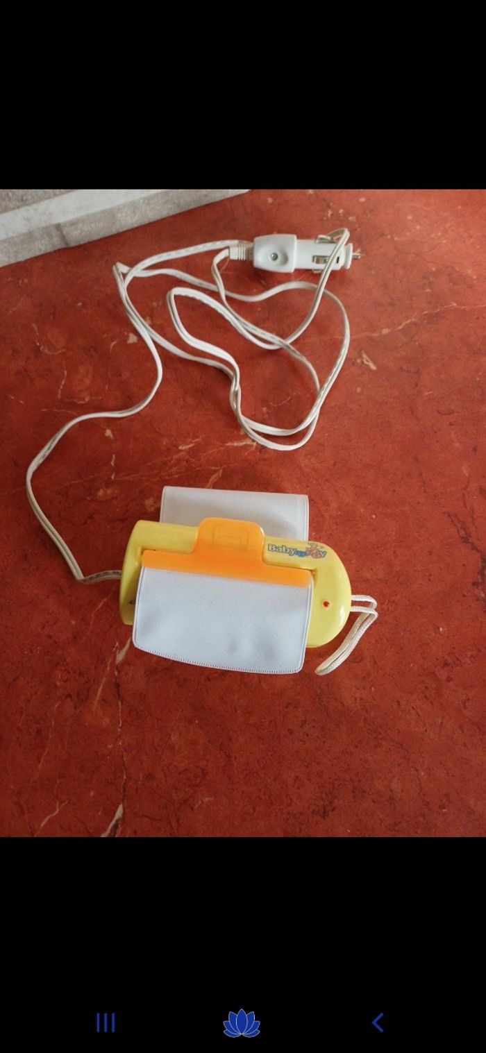 Chauffe biberon voiture