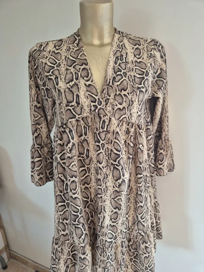 Robe léopard taille m